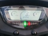 a close up of a motorcycle ' s dashboard with a speedometer
