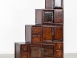 an image of a set of five wooden drawers