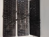 two keyboards that are connected to each other on the wall