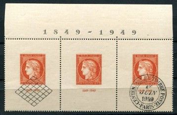 a close up of a stamp with three different stamps on it