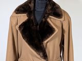 an image of a coat with a fur collar on a mannequin