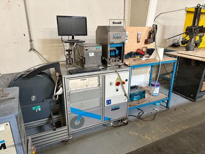 an image of a machine shop with a lot of equipment