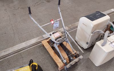 a lot of tools that are sitting on the ground