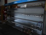 many shelves in the store that are empty of people