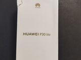 a white box with the logo on it sitting on a table