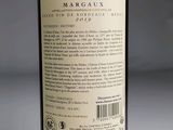 a bottle of wine that is sitting on a table