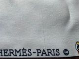 a close up of a hat with the word hermes paris on it