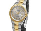 rolex watch with roman numerals on a two - tone stainless steel bracelet
