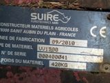 a sign on the side of a building that says sure