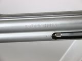 a close up of a gun that is on display