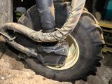 a large tire with a large tire attached to it