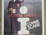 the poster for the movie come to care is hanging on the wall
