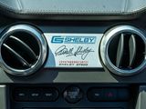 a close up of a car ' s dashboard with a sticker on it