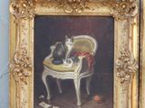 painting of a cat sitting on a chair next to a painting of a cat
