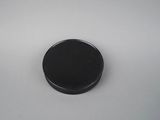 a close up of a hockey puck sitting on top of a table