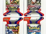 quatre paquets de cartes à collectionner Pokémon dans un lot
