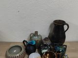 many different types of pottery on the table