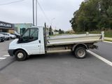 a white truck that is parked in a parking lot