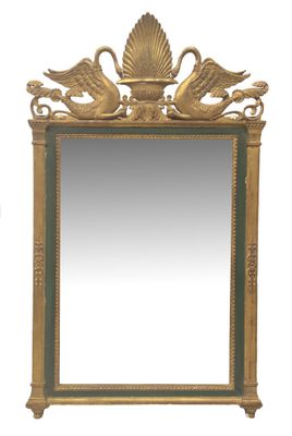MIROIR en bois et stuc doré à décor à l'amortissement de deu…