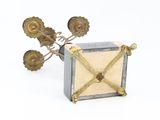 a small clock that is sitting on a table