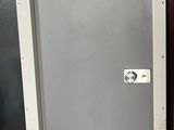 two doors that are next to each other on a wall