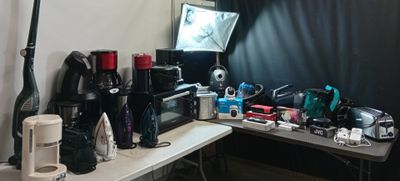 a desk with a lot of items on it