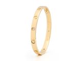 Bague Cartier Love en or jaune 18 carats sertie de diamants