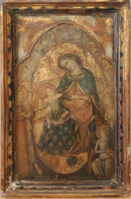 tableau représentant la Vierge Marie et l'Enfant Jésus dans un cadre doré