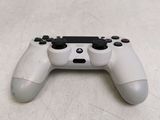 a close up of a video game controller on a table