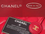 chanel red quilted leather handbag with gold hardware and tag