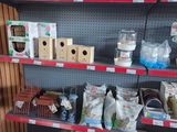 many shelves with various items on them in a store