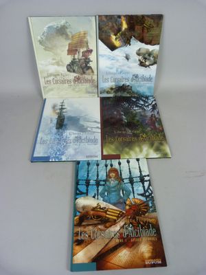 quatre livres pour enfants sont posés sur une surface blanche