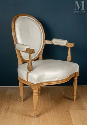 an image of a white chair sitting on top of a hard wood floor