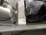 a blender sitting on top of a table next to a blender