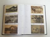 an open book with pictures of people and animals on it