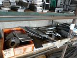 many different types of metal items on a shelf
