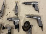 a lot of tools that are sitting on a table