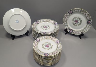 five plates on the table with a small plate in the middle