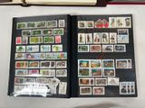 a lot of stamps on the pages of a book