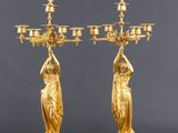 a pair of gilded bronze and marble candelabs