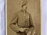 an old photo of a man in a military uniform