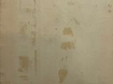 an old book with some writing on it sitting on a table