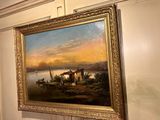 a painting hanging on the wall of a room