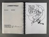 a book with a drawing of a cartoon character on it