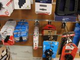 many different items on the wall in this store