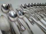 a lot of spoons and spoon spoons on the table