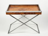 a wooden tray with metal legs and a metal base