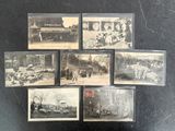 several old black and white photographs of people and vehicles