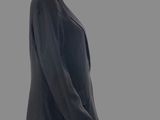 an image of a mannequin dressed in a black suit and tie