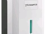 a close up of a white paper towel dispenser on a white background